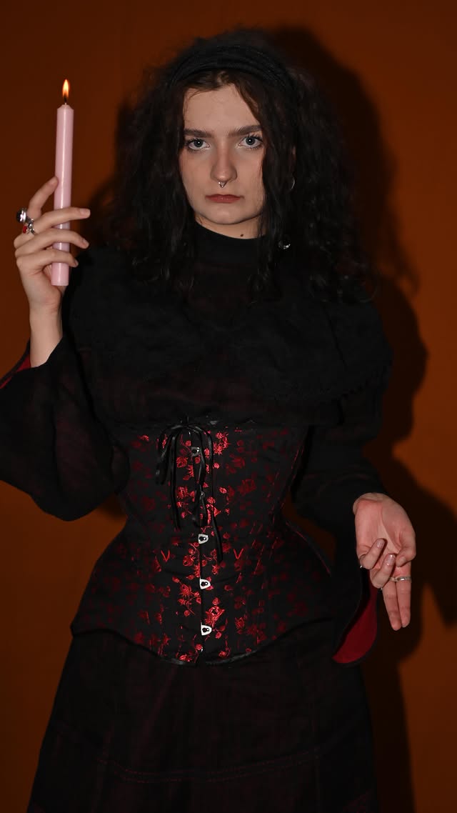 Model wearing an AV Atelier corset and dress